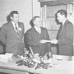 Dr. Reiner Bonde (center) accepting Honorary Life Membership Certificate from President Hougas at Annual Banquet of the Potato Association of America, Dec. 2, 1957. Paul Mosher (left) sponsored Dr. Bonde.